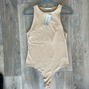 Gaze DTLA tan high neck sleeveless bodysuit. New with tags, size large.